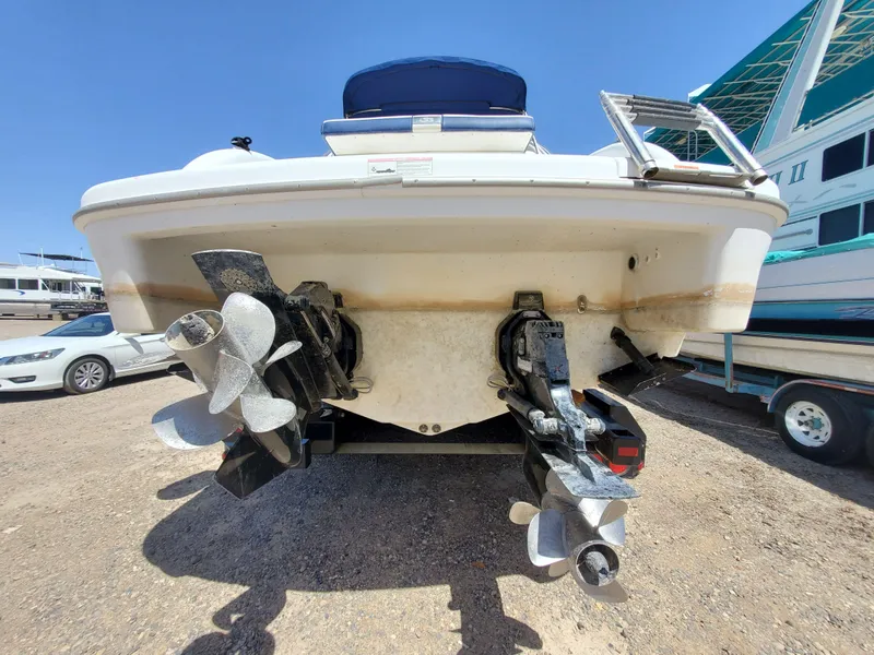 Slide: The Image of 2012 Formula 310 Sun Sport boat rear view with dual propellers. - 37