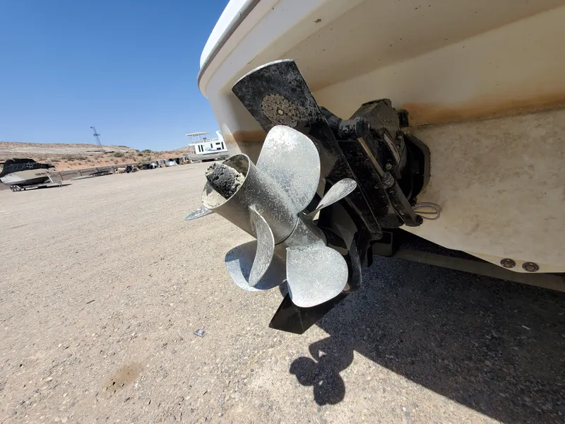 Slide: The Image of Close-up of a 2012 Formula 310 Sun Sport boat propeller on dry land. - 38