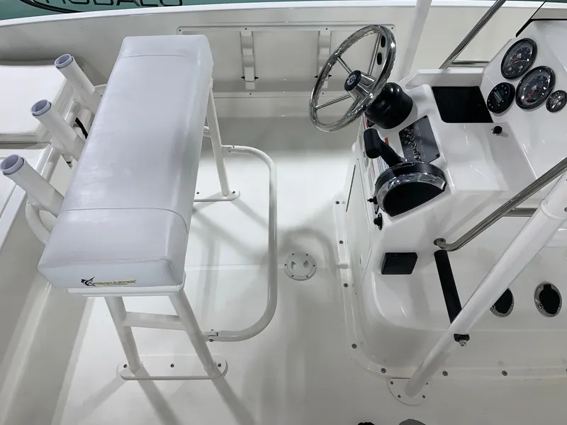 Slide: The Image of 2024 Bayliner T21 Bay boat interior with steering console and seating. - 10