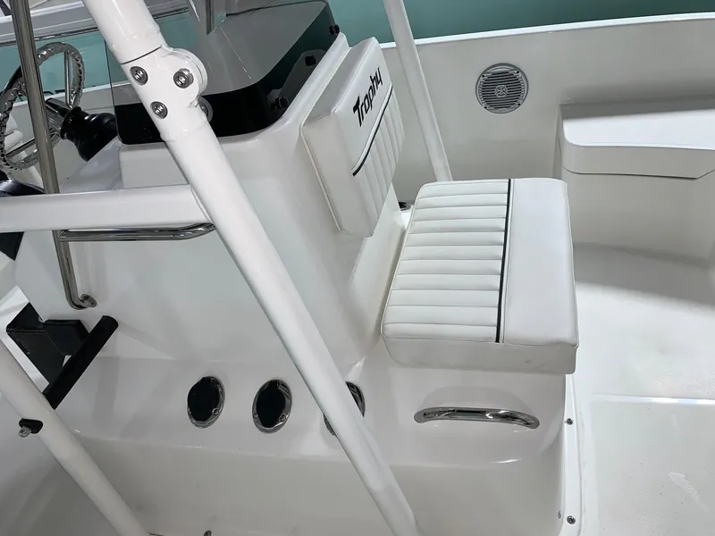 Slide: The Image of 2024 Bayliner T21 Bay boat interior with white seating and control console. - 13
