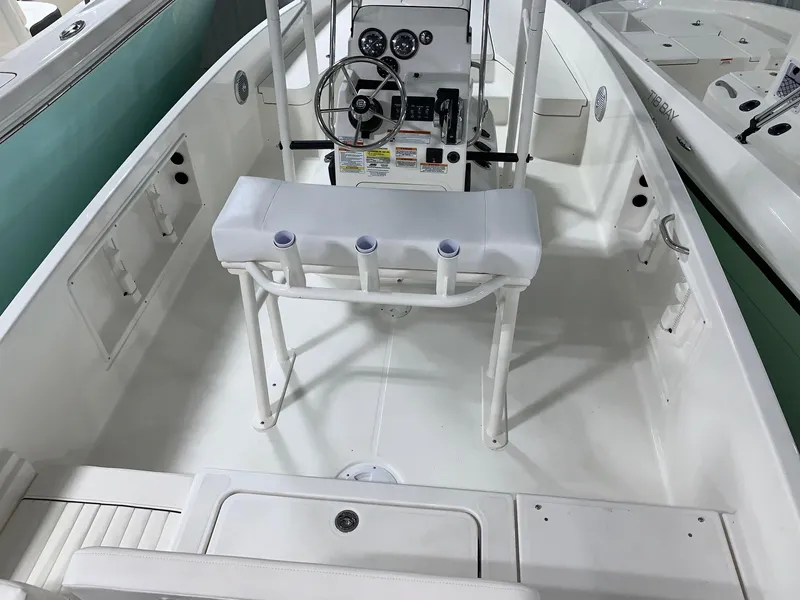 Slide: The Image of 2024 Bayliner T21 Bay boat interior with steering console and seating. - 5