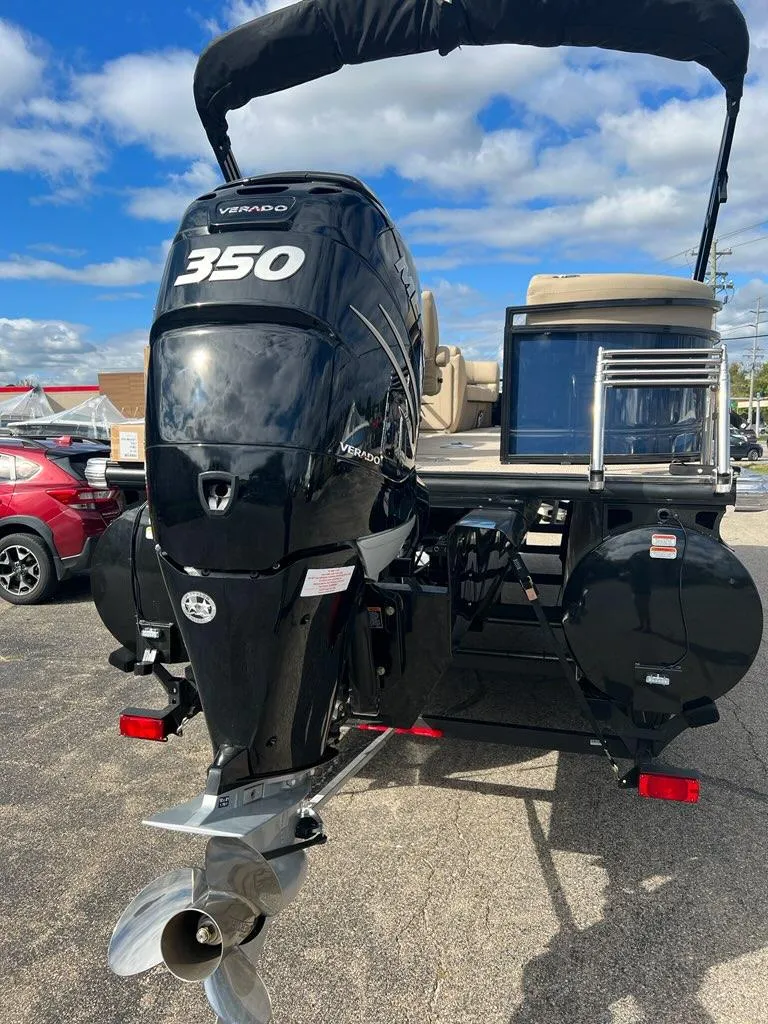 Slide: The Image of 2022 Regency 250 LE3 pontoon boat with a powerful 350 horsepower engine. - 4