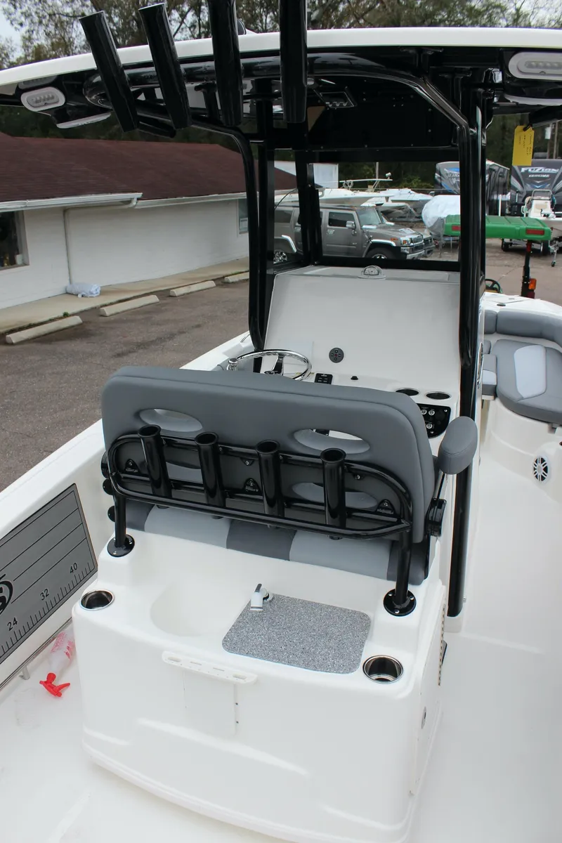 Slide: The Image of 2023 NauticStar 251 Hybrid boat interior with seating and storage. - 14