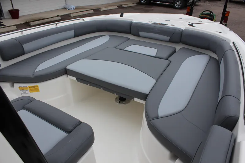 Slide: The Image of 2023 NauticStar 251 Hybrid boat with spacious cushioned seating area. - 15