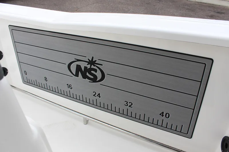 Slide: The Image of NauticStar 251 Hybrid 2023 boat with built-in fish ruler. - 18