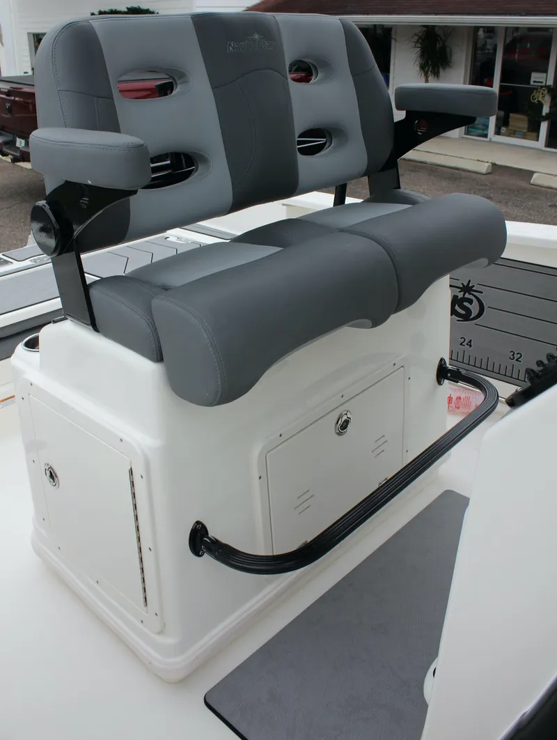 Slide: The Image of 2023 NauticStar 251 Hybrid boat seating and storage compartment. - 24