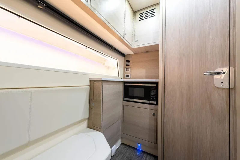 Slide: The Image of Interior of 2026 Scout 377 LXF featuring modern kitchenette. - 15