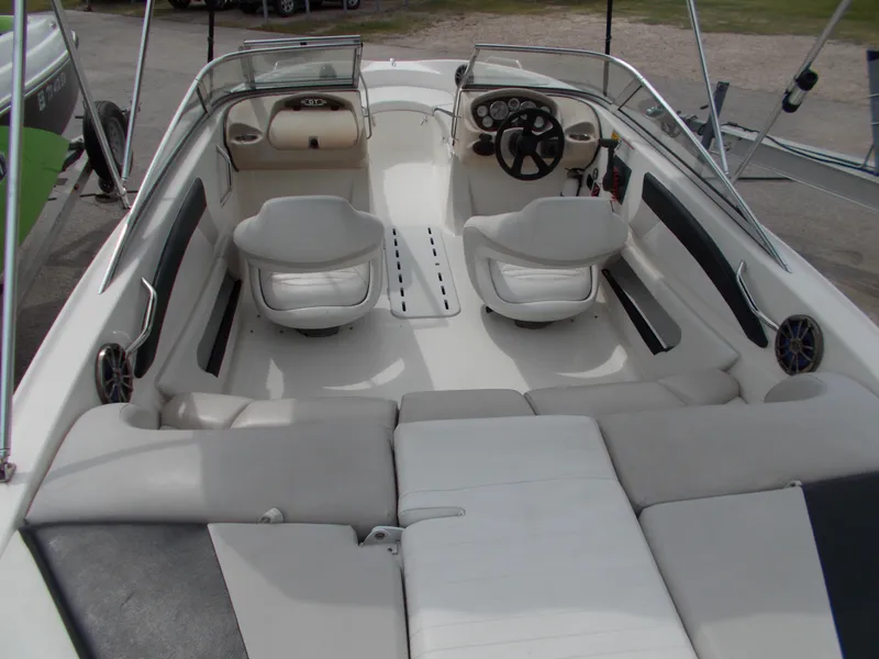Slide: The Image of 2008 Glastron GT 205 boat interior with seating and steering wheel. - 11