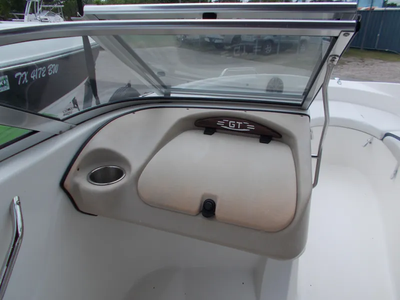 Slide: The Image of 2008 Glastron GT 205 boat interior with open glove compartment. - 17
