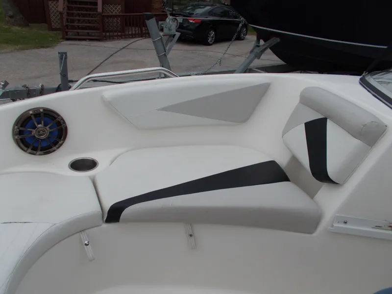 Slide: The Image of 2008 Glastron GT 205 boat interior seating with speaker and cup holder. - 5