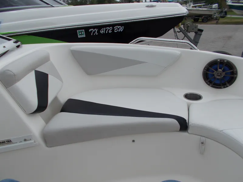 Slide: The Image of 2008 Glastron GT 205 boat interior seating with black and white upholstery. - 7