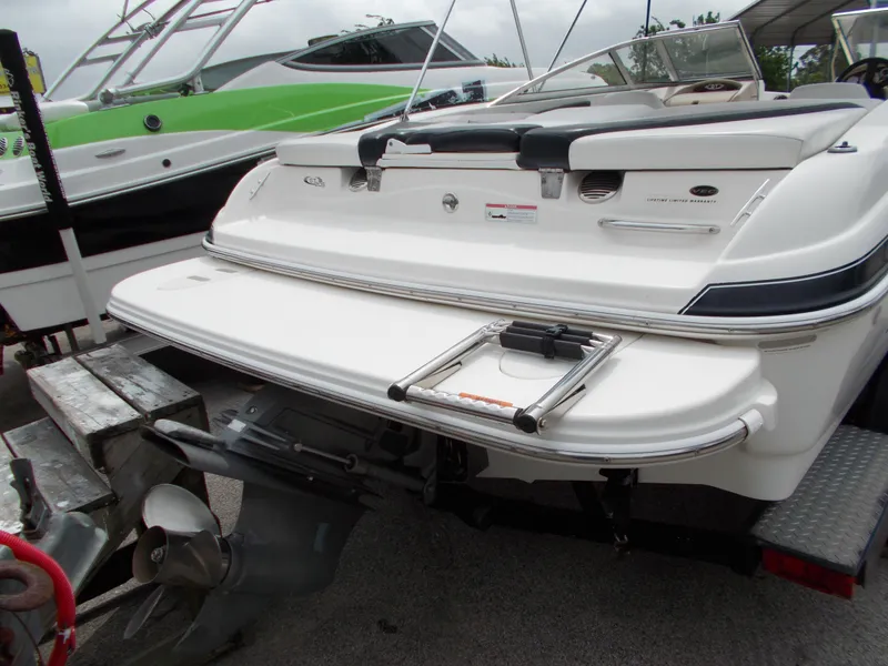 Slide: The Image of 2008 Glastron GT 205 boat rear view with swim platform and ladder. - 9