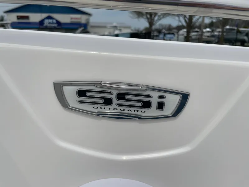 Slide: The Image of 2024 Chaparral 21 SSi OB boat emblem close-up. - 12