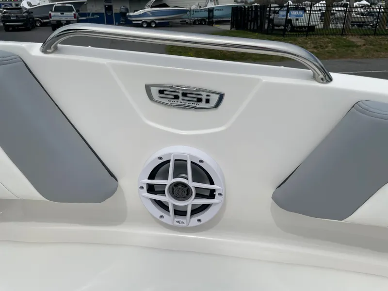 Slide: The Image of 2024 Chaparral 21 SSi OB boat interior with speaker and logo. - 13