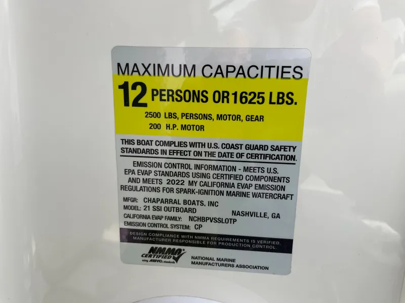 Slide: The Image of 2024 Chaparral 21 SSi OB boat capacity label: 12 persons or 1625 lbs, 200 HP motor. - 24