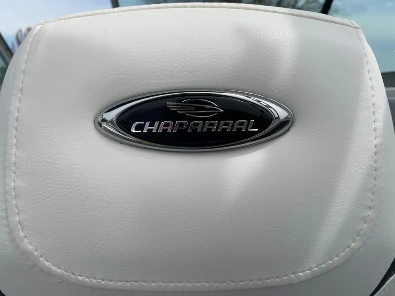 Slide: The Image of Chaparral 21 SSi OB 2024 logo on white leather seat. - 37