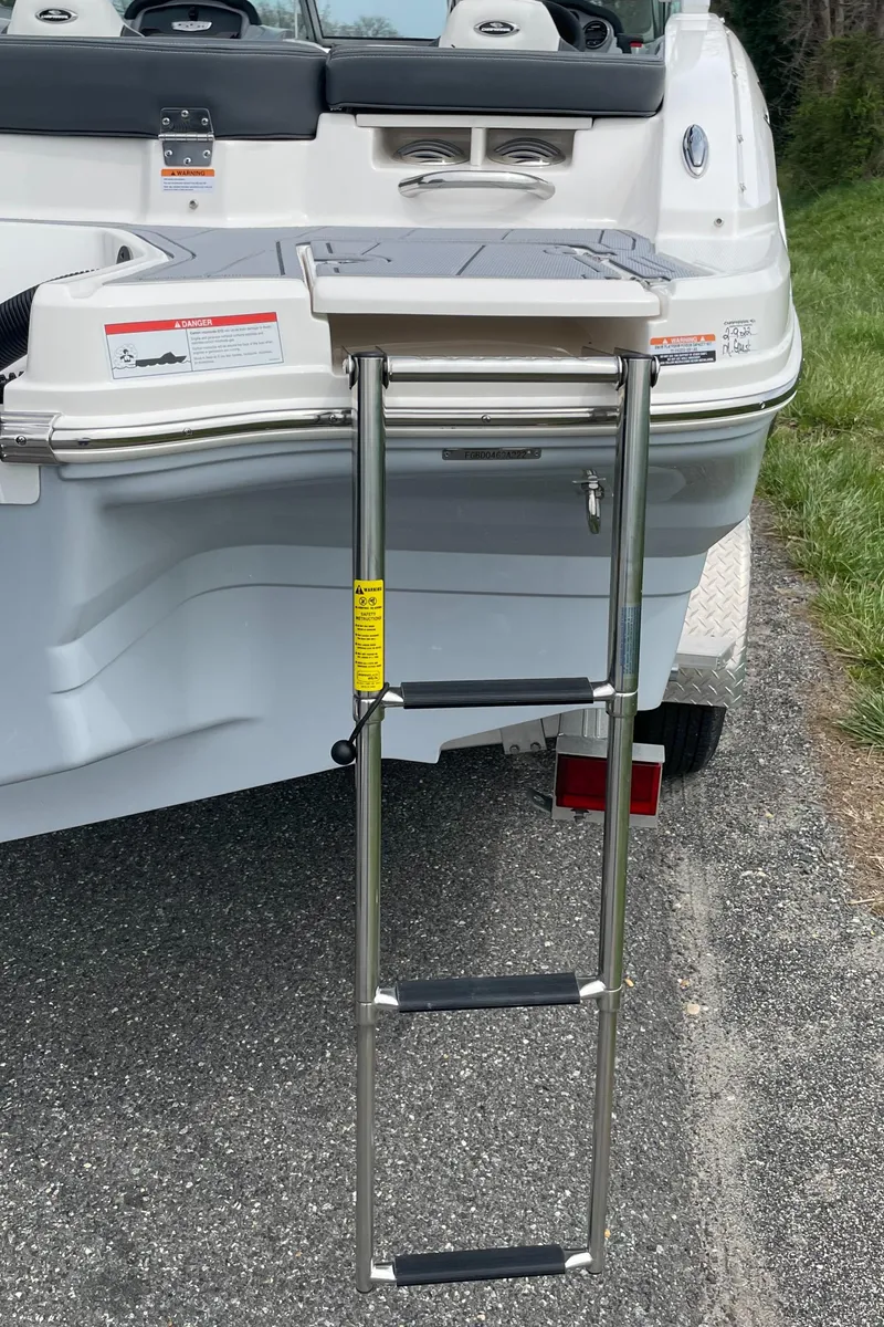 Slide: The Image of 2024 Chaparral 21 SSi OB boat with extended swim platform and ladder. - 46