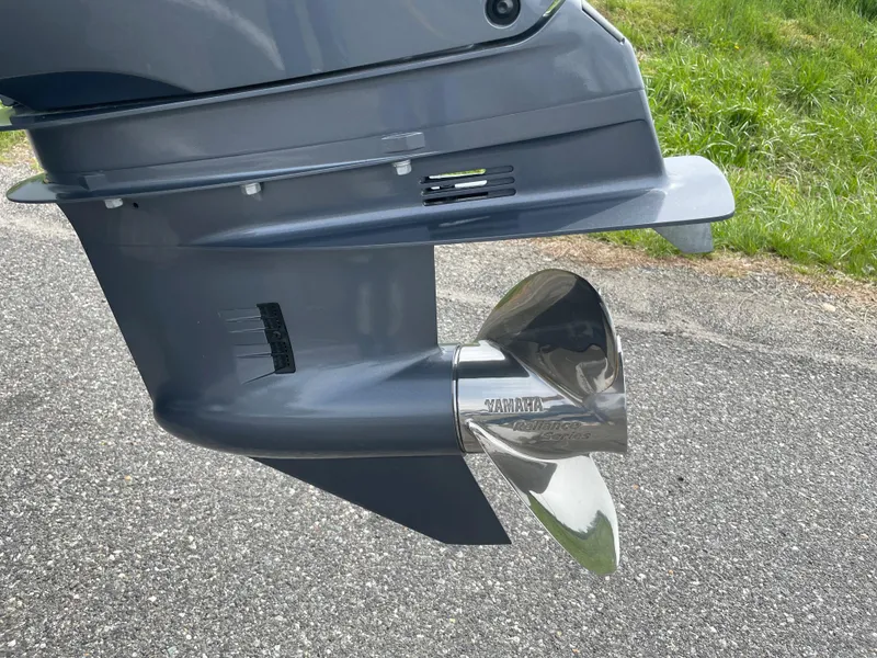 Slide: The Image of Close-up of 2024 Chaparral 21 SSi OB outboard motor propeller. - 49