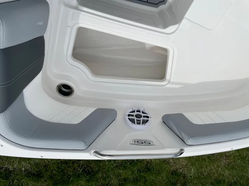 Slide: The Image of 2024 Chaparral 21 SSi OB boat interior seating and storage compartment. - 7