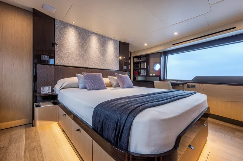 Slide: The Image of Luxurious bedroom interior of 2025 Absolute 56 FLY yacht with modern design and ocean view. - 19