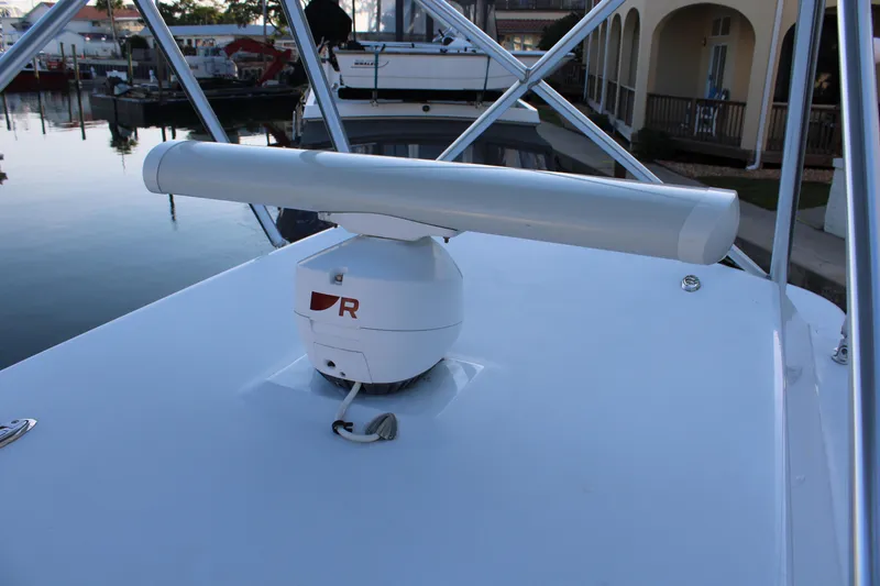 Slide: The Image of Radar system on 2010 Legend 37 Walkaround boat docked at marina. - 15