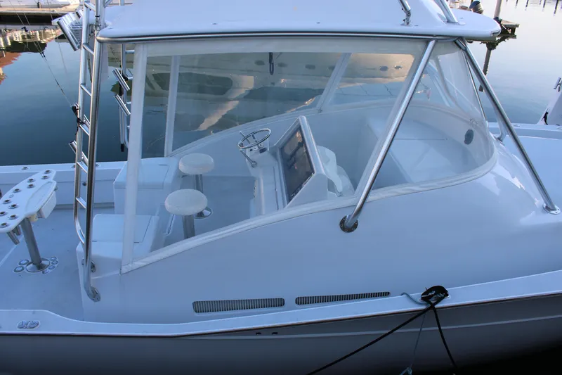 Slide: The Image of 2010 Legend 37 Walkaround boat with enclosed helm and seating. - 16
