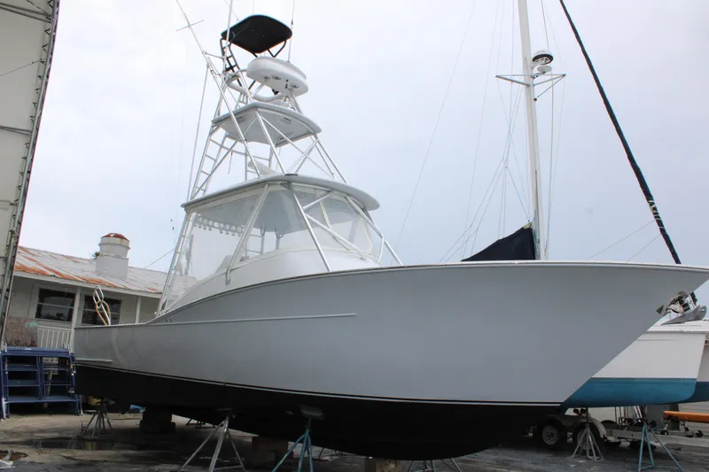 Slide: The Image of 2010 Legend 37 Walkaround boat on stands, ready for maintenance. - 17