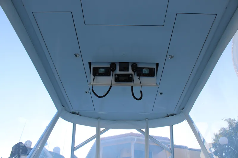 Slide: The Image of 2010 Legend 37 Walkaround boat electronics and control panel. - 3