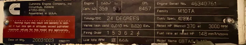 Slide: The Image of A Cummins engine plate displaying technical specifications and serial numbers. - 32