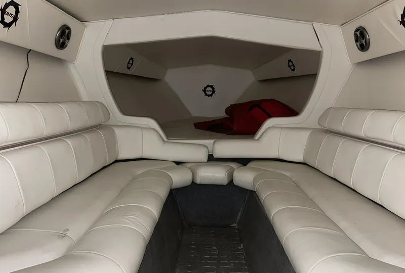 Slide: The Image of Interior of 1999 Fountain 47 Lightning boat with white leather seating. - 18