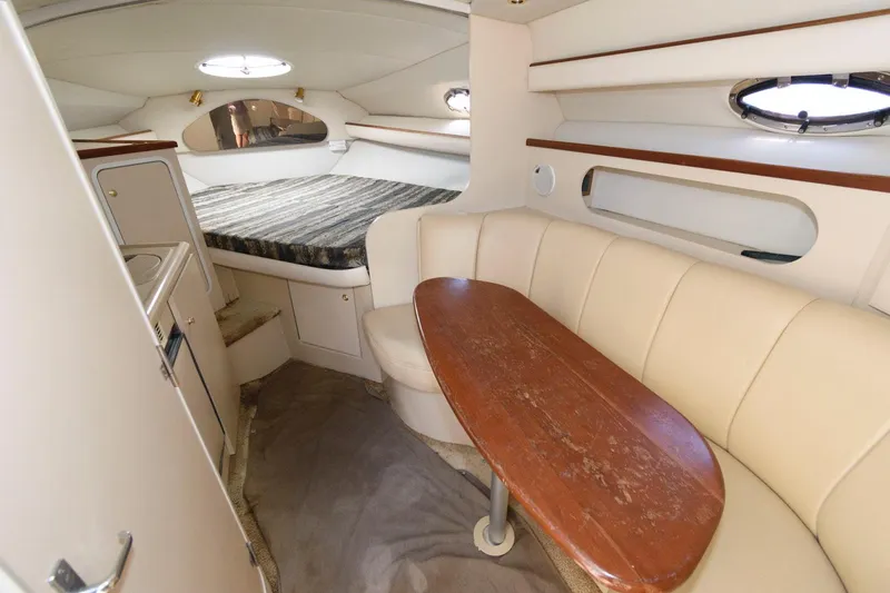 Slide: The Image of Interior cabin of 2000 Cruisers Yachts 2870 Express with seating and bed. - 6