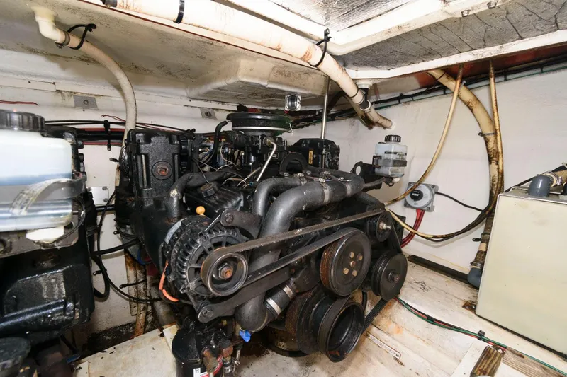Slide: The Image of Engine compartment of a 2000 Cruisers Yachts 2870 Express boat. - 14