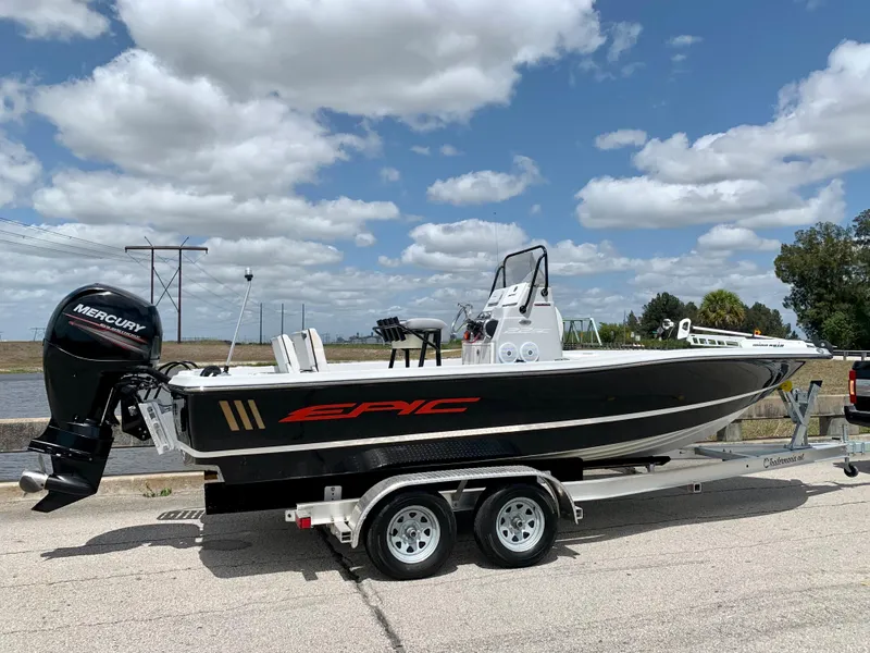 Slide: The Image of 2015 Epic 22SC Bay Boat on trailer with Mercury outboard motor. - 10