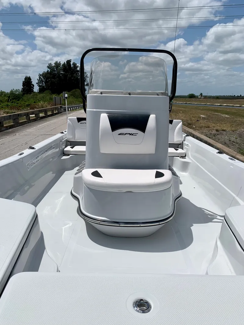 Slide: The Image of 2015 Epic 22SC Bay Boat with center console on a sunny day. - 15
