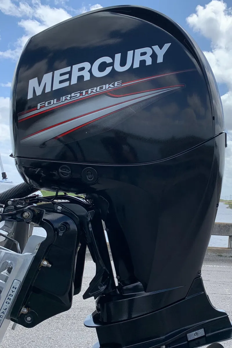 Slide: The Image of Mercury FourStroke outboard motor on a 2015 Epic 22SC Bay Boat. - 22