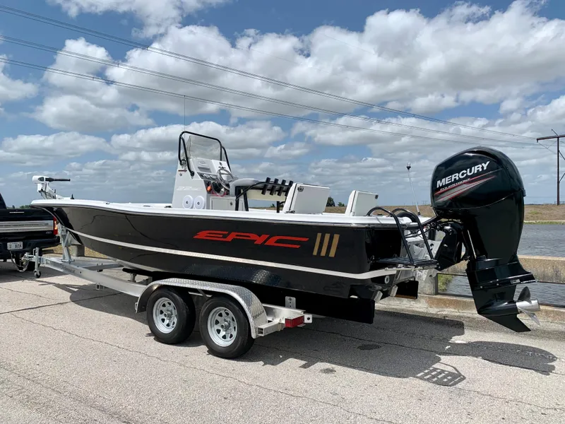 Slide: The Image of 2015 Epic 22SC Bay Boat with Mercury outboard motor on trailer. - 5