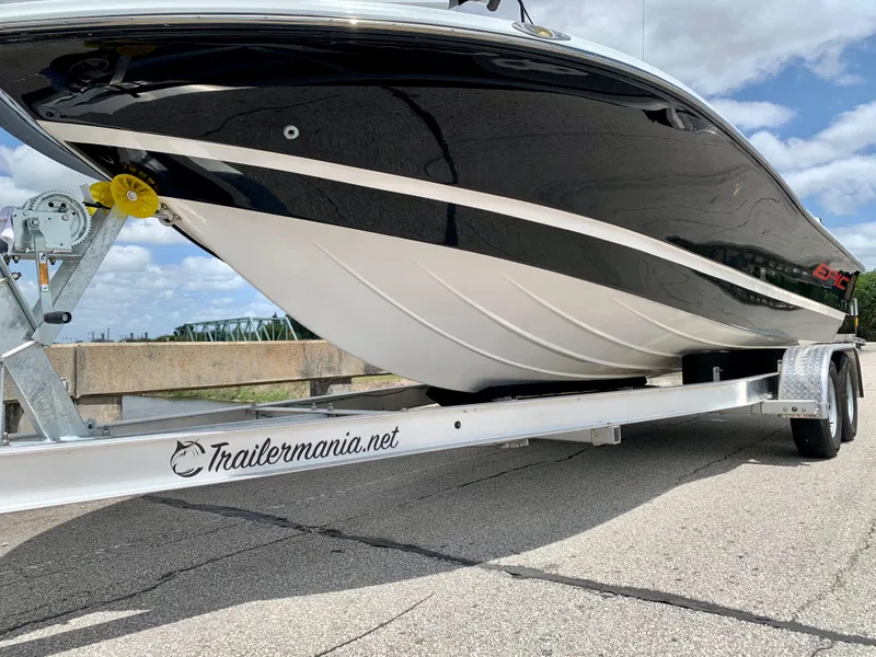 Slide: The Image of 2015 Epic 22SC Bay Boat on Trailemania.net trailer, side view. - 7