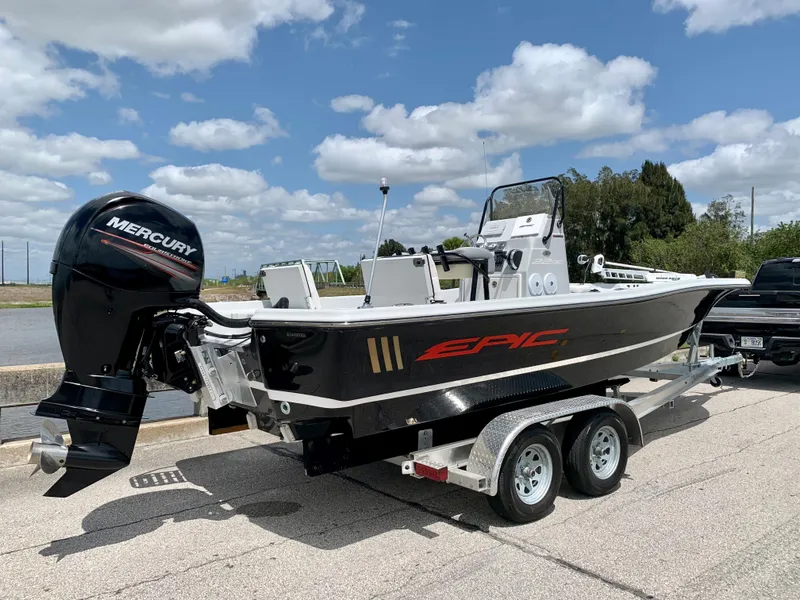 Slide: The Image of 2015 Epic 22SC Bay Boat on trailer with Mercury outboard motor. - 9