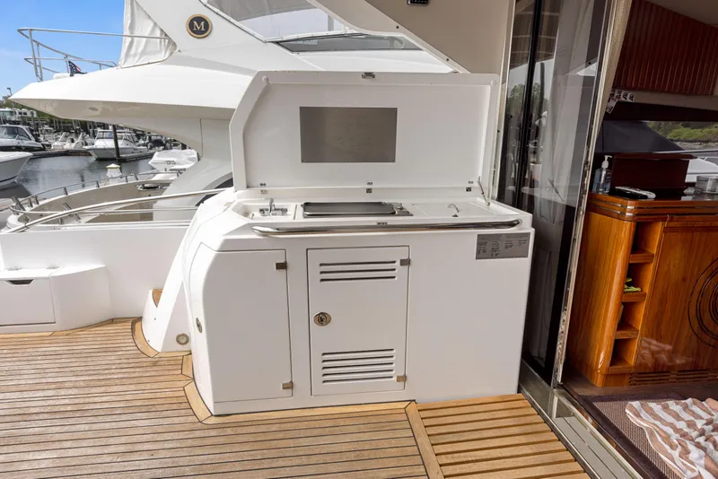Slide: The Image of Outdoor kitchen on a 2015 Sunseeker Predator 68 yacht. - 11