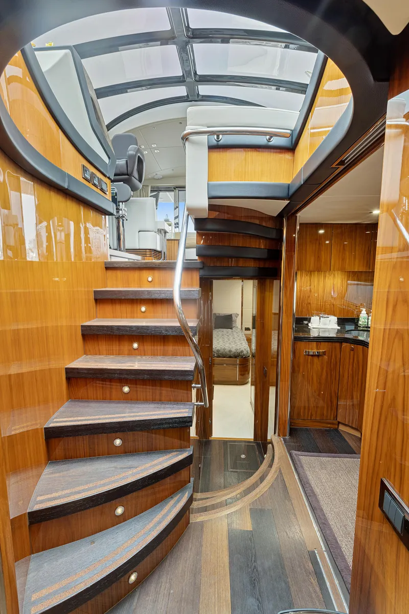 Slide: The Image of Interior of 2015 Sunseeker Predator 68 yacht with wooden staircase and modern design. - 22