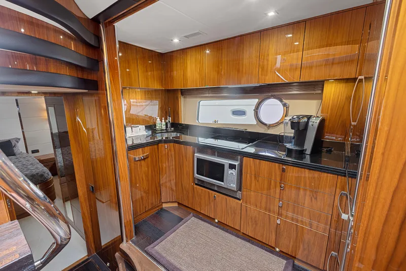 Slide: The Image of Luxurious kitchen interior of 2015 Sunseeker Predator 68 yacht with modern appliances. - 23
