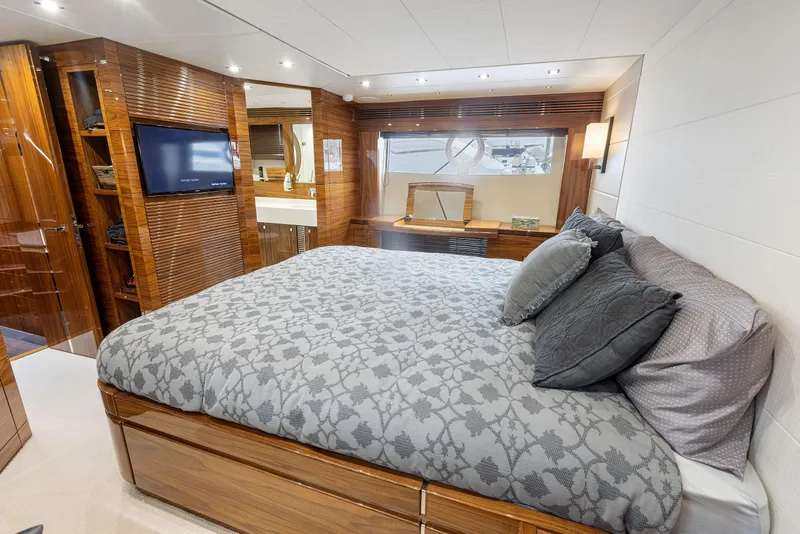 Slide: The Image of Luxurious bedroom interior of 2015 Sunseeker Predator 68 yacht with modern amenities. - 27