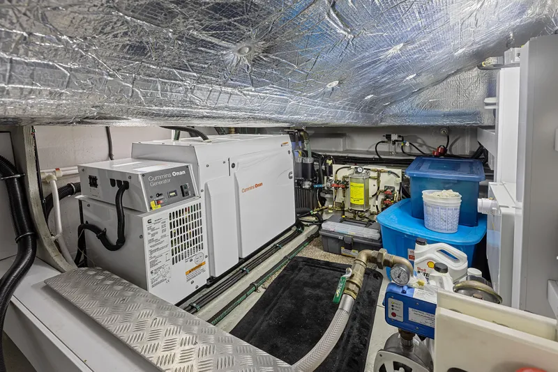 Slide: The Image of Engine room of a 2015 Sunseeker Predator 68 yacht with generator and equipment. - 38