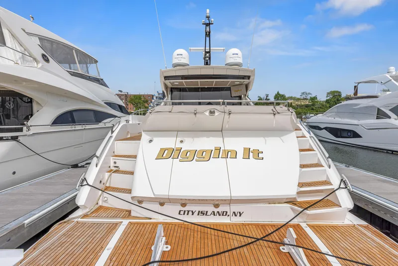 Slide: The Image of 2015 Sunseeker Predator 68 yacht docked, named Diggin It, City Island, NY. - 4