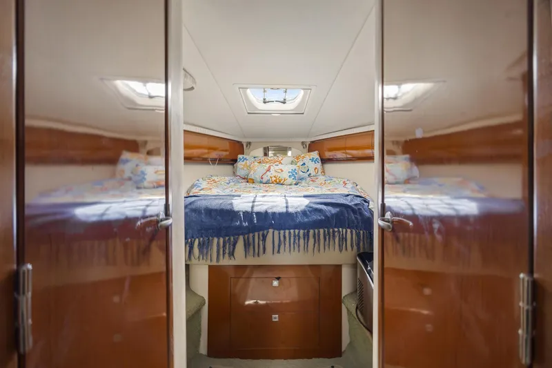 Slide: The Image of Luxurious cabin interior of 2008 Sea Ray 44 Sundancer yacht with cozy bedding. - 23