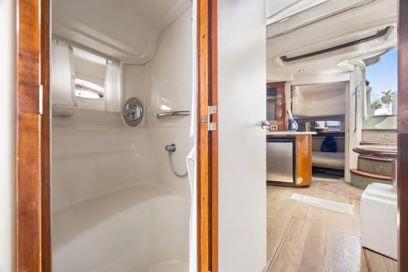 Slide: The Image of 2008 Sea Ray 44 Sundancer interior with shower and cabin view. - 27
