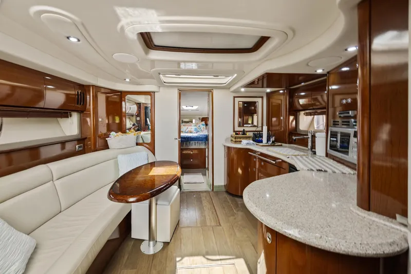 Slide: The Image of Luxurious interior of 2008 Sea Ray 44 Sundancer yacht with elegant wood finishes. - 31