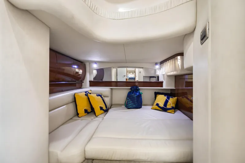 Slide: The Image of Interior of 2008 Sea Ray 44 Sundancer yacht with cozy seating and decorative pillows. - 34