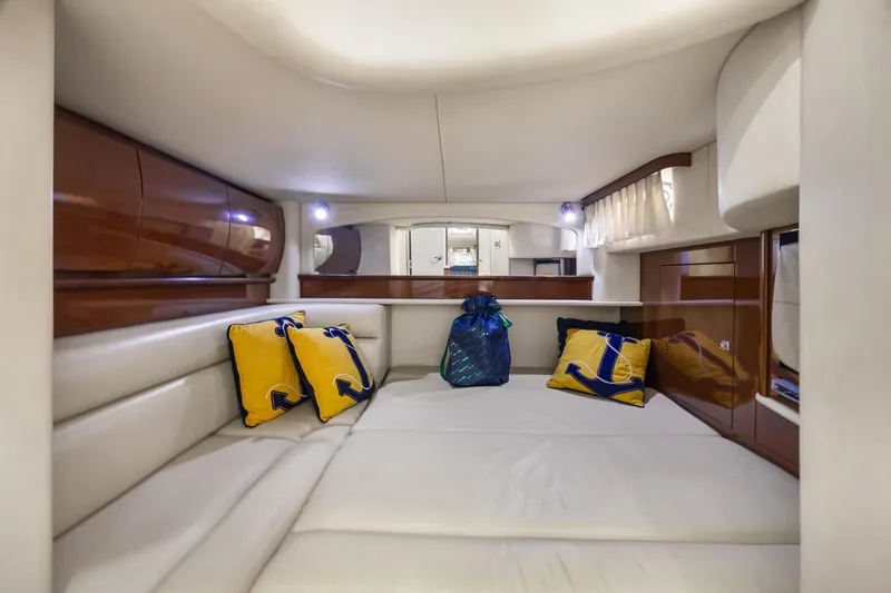 Slide: The Image of Luxurious interior cabin of 2008 Sea Ray 44 Sundancer yacht with plush seating and cushions. - 35