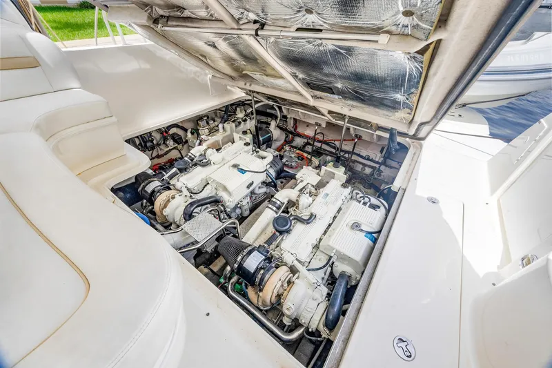Slide: The Image of Engine compartment of 2008 Sea Ray 44 Sundancer yacht, showcasing dual engines and clean interior. - 40